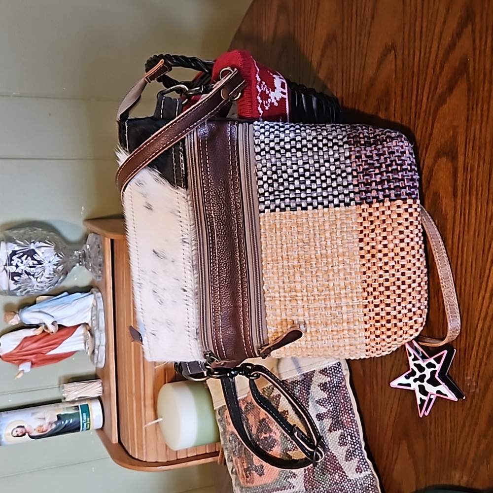 Euc Myra crossbody with leather n cowhide. Medium size also has extra strap thin